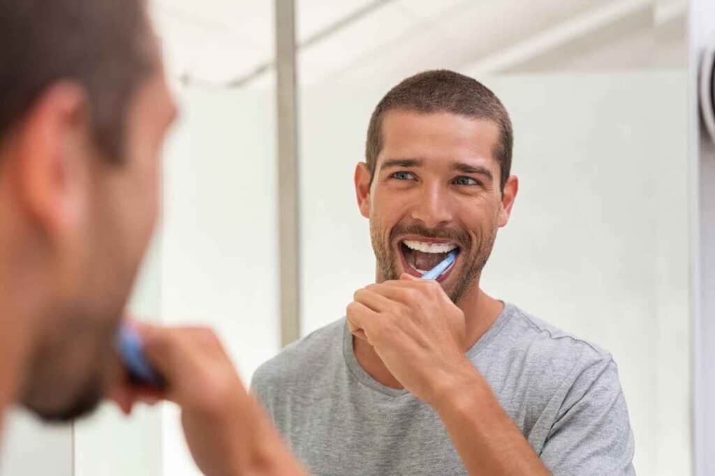 Men Brushing his Teeth Infront of Mirror | Smile Virtual