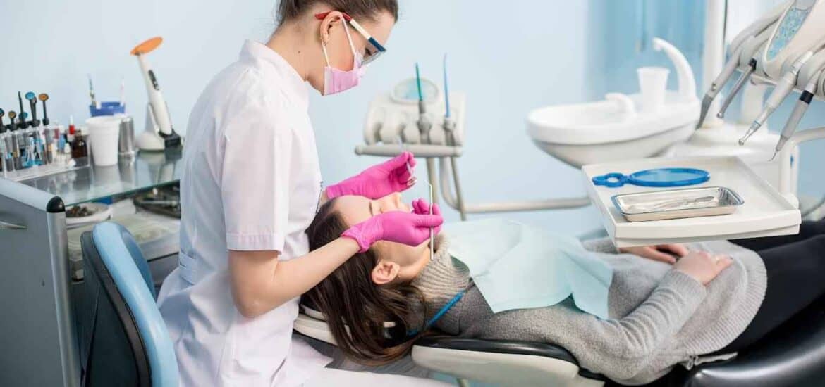Young Woman Receiving Dental Implant Treatment at Clinic | Smile Virtual