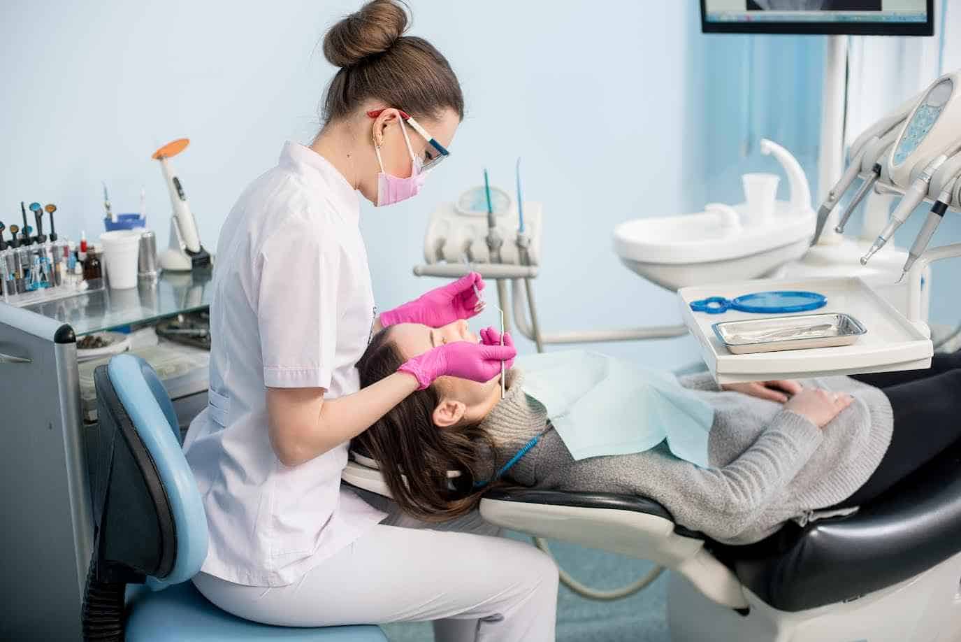 Young Woman Receiving Dental Implant Treatment at Clinic | Smile Virtual