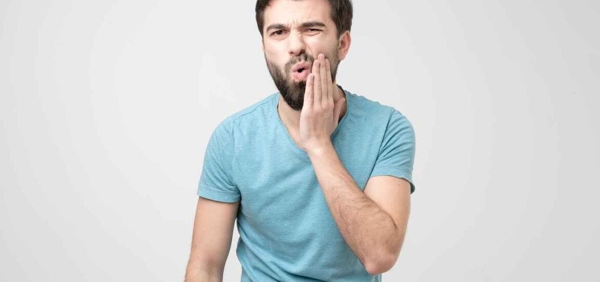 Man Showing Sensitivity on his Teeth | Smile Virtual