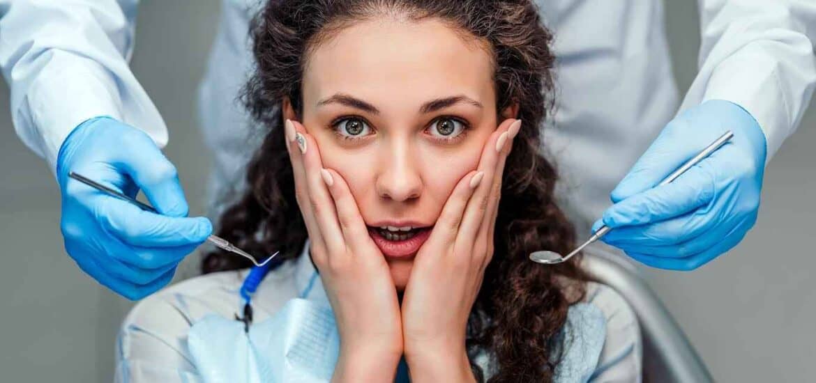 Female Showing Dental Anxiety During Treatment | Smile Virtual