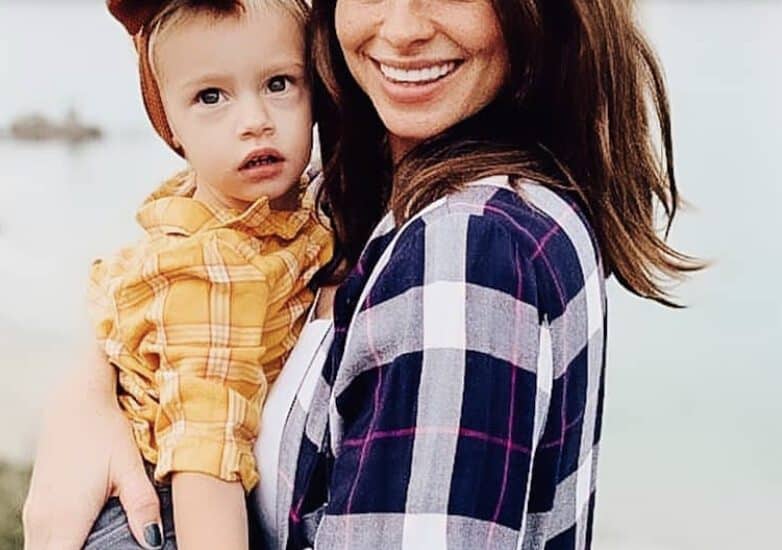Woman Holding Baby with Perfect Smile | Smile Virtual