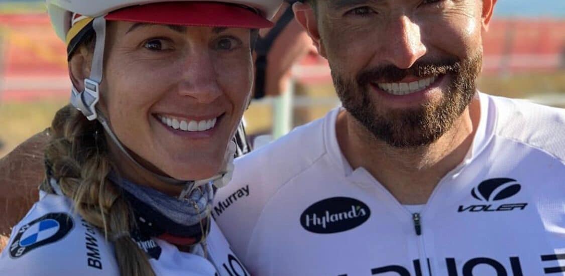 Happy Couple Taking Picture by Wearing Cycling Helmet & Clothes | Smile Virtual